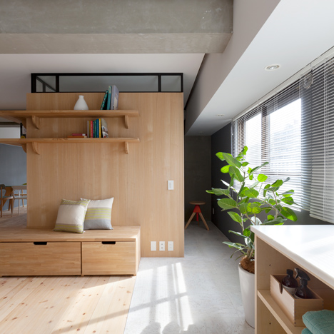 Sinato hides two bedrooms behind an L-shaped wall in Fujigaoka M apartment