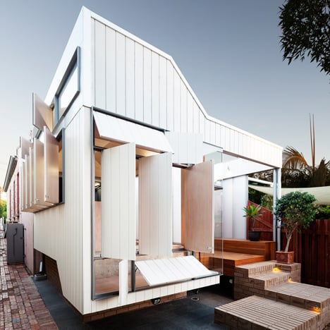 House by Philip Stejskal can be "locked down" with shutters that blend into the facade