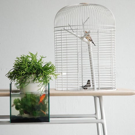 Maxime Mellot's Turia table includes a birdcage, fish tank and plant pot