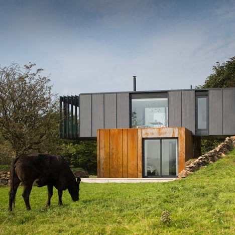 Grillagh Water House by Patrick Bradley is made up of four stacked shipping containers