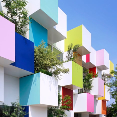 Coloured boxes and plants cover the latest Sugamo Shinkin Bank by Emmanuelle Moureaux