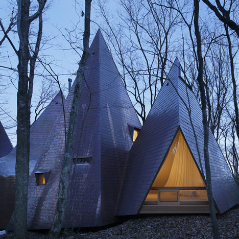 Woodland home by Hiroshi Nakamura designed to resemble a cluster of timber tepees