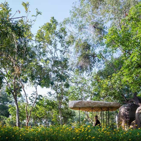 Stone canopy by a21studio forms monastic pagoda in a Vietnam park