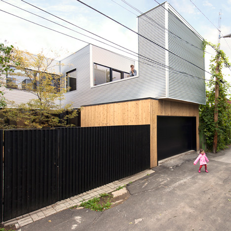 Montreal home updated with corrugated metal cladding and a vibrant staircase