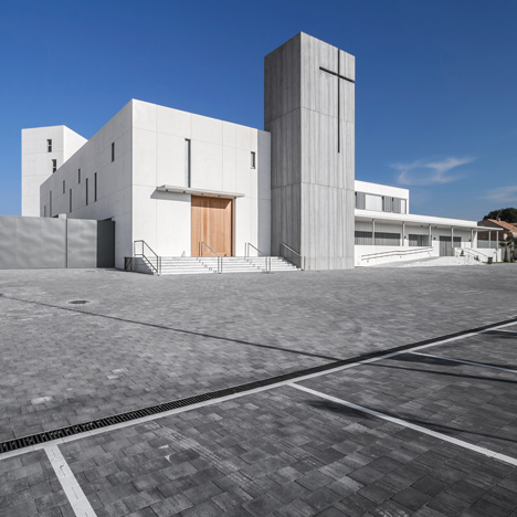 Hernández Arquitectos' minimal white monastery features a concrete-clad bell tower