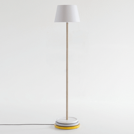 Shelves slide up and down the stem of Yu Ito's Impila lamp