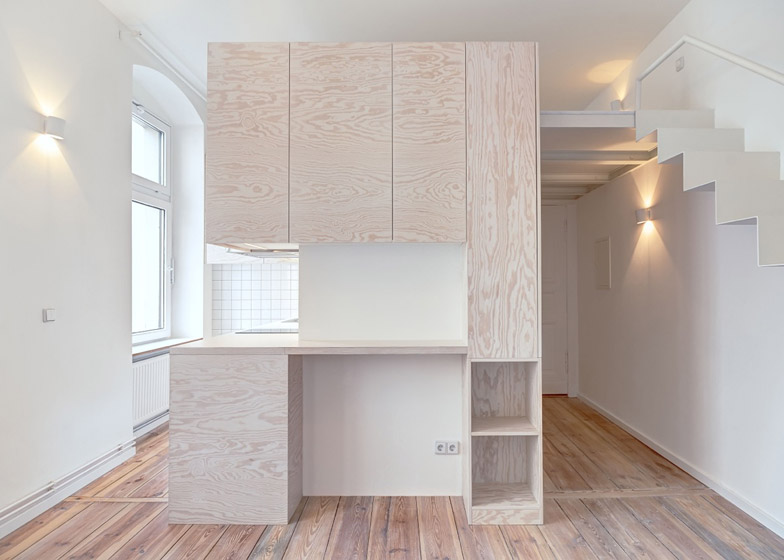 Pale Utility Unit Supports Mezzanine In A Berlin Micro Apartment
