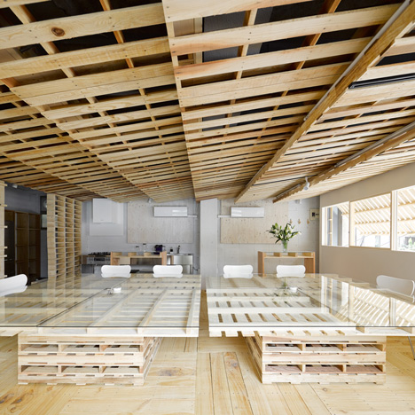 Hiroki Tominaga Atelier uses deconstructed pallets to dress a Tokyo office in planks of timber