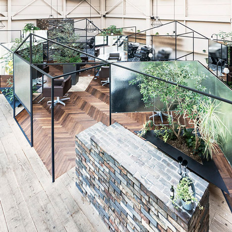 Takehiko Nez divides up a hair salon with mirrors, translucent screens and plants