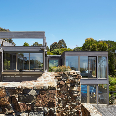 Rugged drystone wall frames Whitehall Road Residence by B.E. Architecture