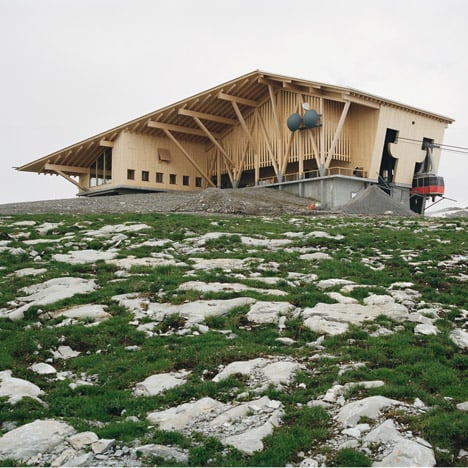 Herzog & de Meuron completes a mountain-top restaurant around a cable car station