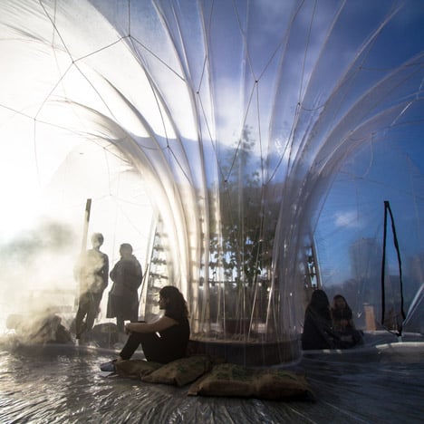 Inflatable dome on the banks of the River Thames is filled with aromatic fog