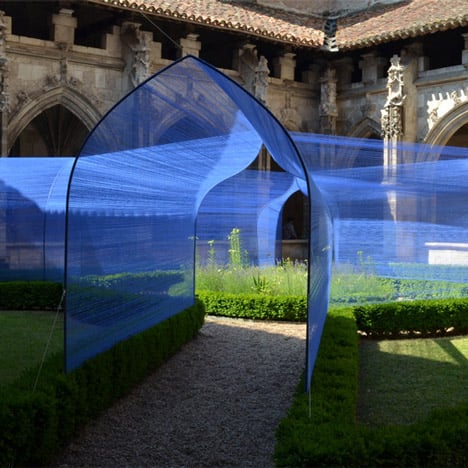 Atelier Yokyok installs vaulted string tunnels&ltbr /&gt in a Gothic cloister garden