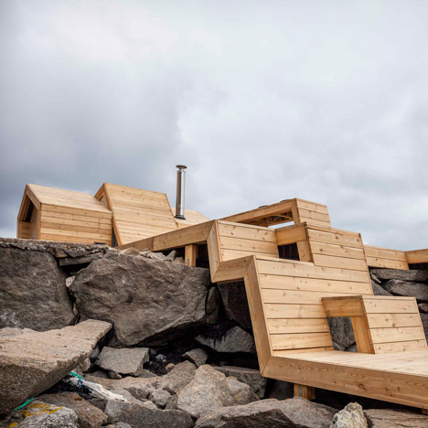 Oslo architecture students build a wooden sauna that steps over the Norwegian landscape