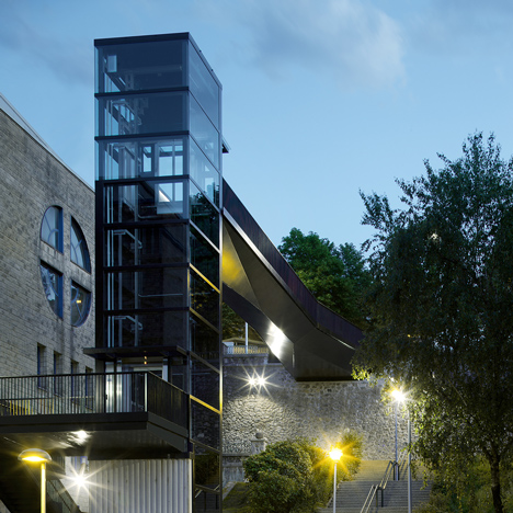 Glass elevator and steel bridge by Vaumm connect two neighbourhoods in a Spanish town
