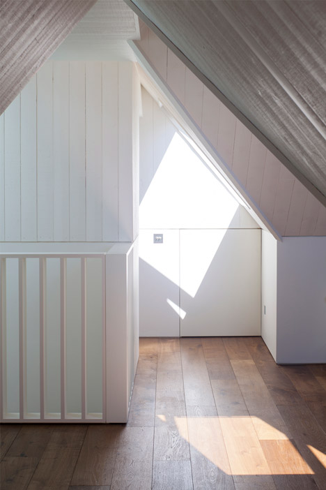 West Heath loft conversion with a secret room by Milford Martin Architects