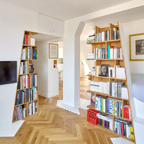 h2o Architectes adds angular shelving units to a book collector's Parisian loft apartment