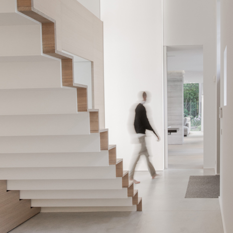 Contekst combines oak, stone and concrete inside a minimal Belgian house architecture Dezeen