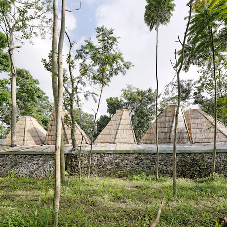 Budi Pradono Architects' bamboo house mimics the shapes of nearby buildings and mountains