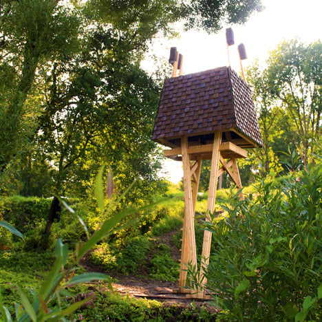 The Wild Thing is a "creature-like" cabin that stands tall above a Latvian wildflower meadow