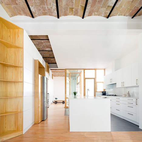 Cavaa Arquitectes exposes vaulted ceiling inside revamped Barcelona apartment