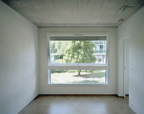 Concrete apartment building in Zellweger Park by Herzog and de Meuron