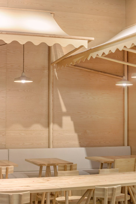 Onion's solid ash and plywood restaurant interior in Bangkok