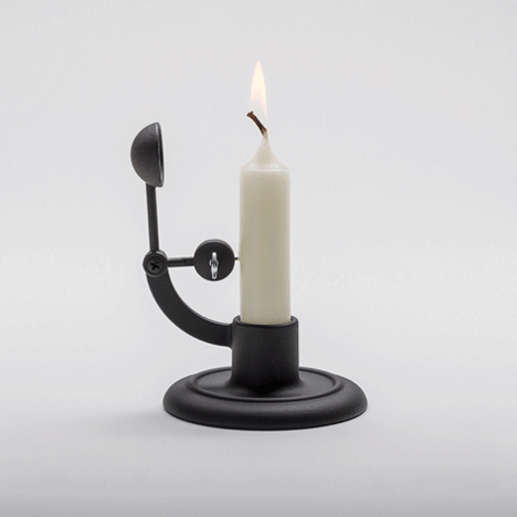 This month's Christmas inspired theme of the month explores the themes of candlelight: Lars Beller Fjetland designs self-extinguishing Moment candlestick for Wrong for Hay via: http://www.dezeen.com/tag/candle-holders/