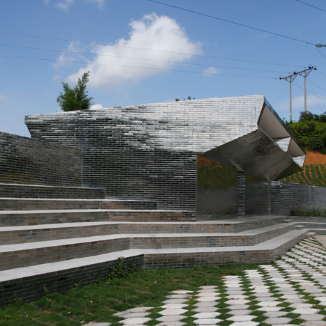 Rural Urban Framework uses mirrored tiles to camouflage toilets at Mulan Primary School