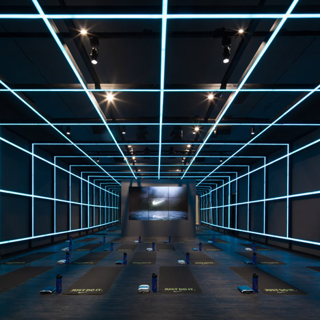Coordination Asia uses neon grids to transform a Beijing art gallery into a gym for Nike