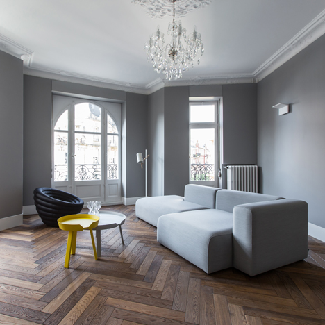 YCL adds colourful furniture accents to monochrome Strasbourg apartment