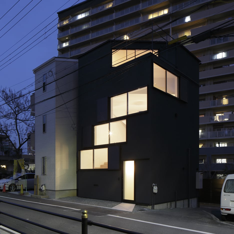 Windows spiral towards the roof of Osaka house by Alphaville Architects