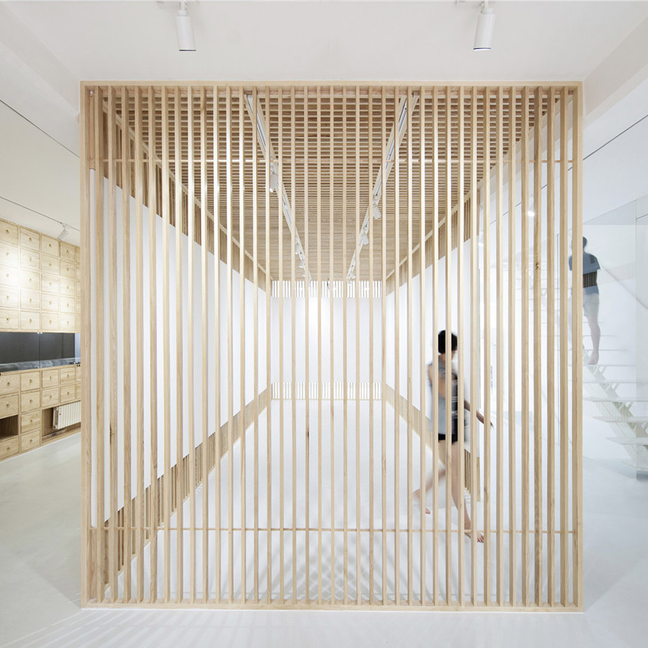 Arch Studio adds foldaway walls to Beijing art gallery