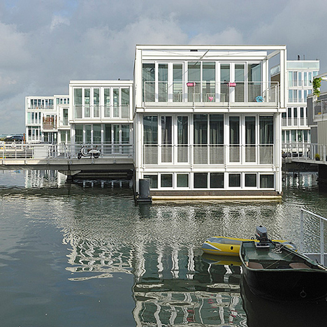Water-houses in Amsterdam's IJburg neighbourhood by Dutch firm Marlies Rohmer Architects & Urbanists float in concrete tubs 
