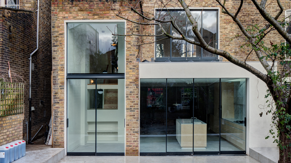 APA creates warehouse-inspired interior for London townhouse