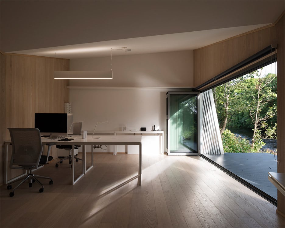 The Rivershed office built on a riverbank in Wales by Freshwest