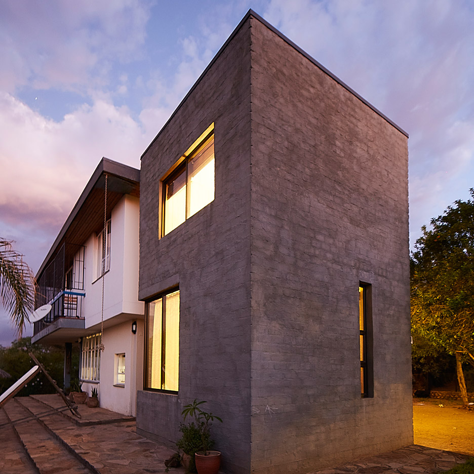 Phillip Lühl uses "bagged concrete bricks" to build two extensions to a Namibia house