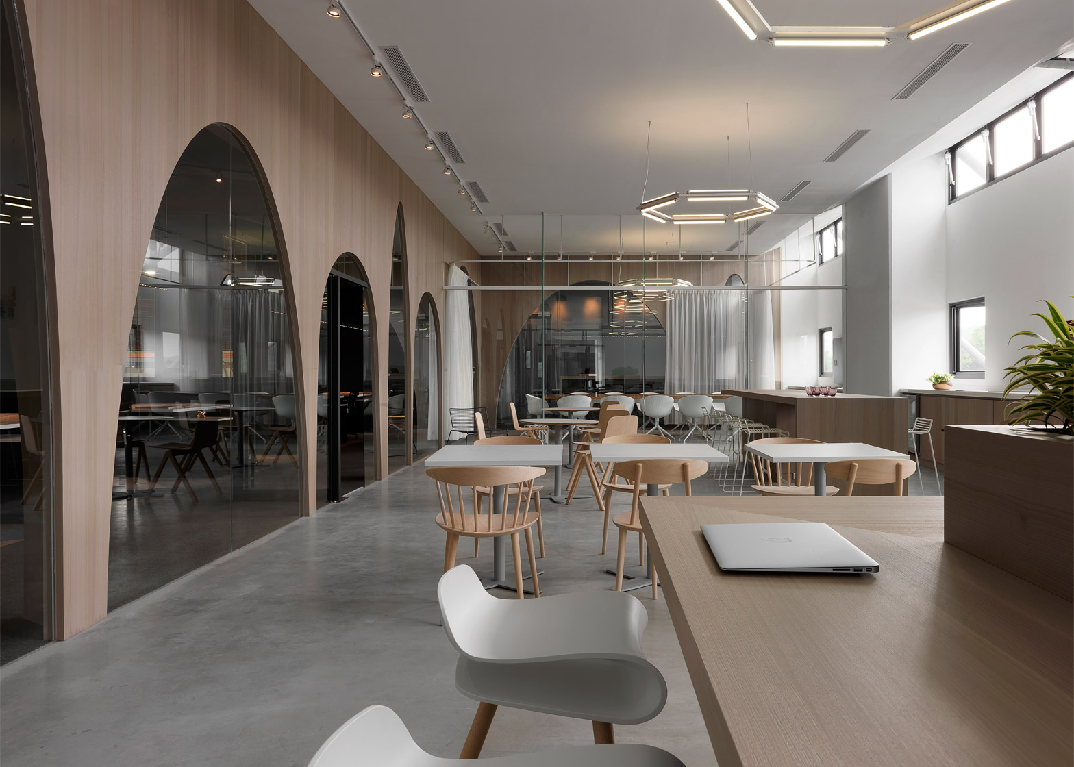 JC Architecture adds wooden arches H&M's office