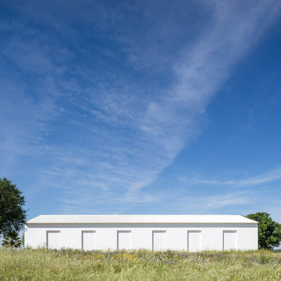 Aboim Inglez Arquitectos adds bright white extension to farmhouse in rural Portugal