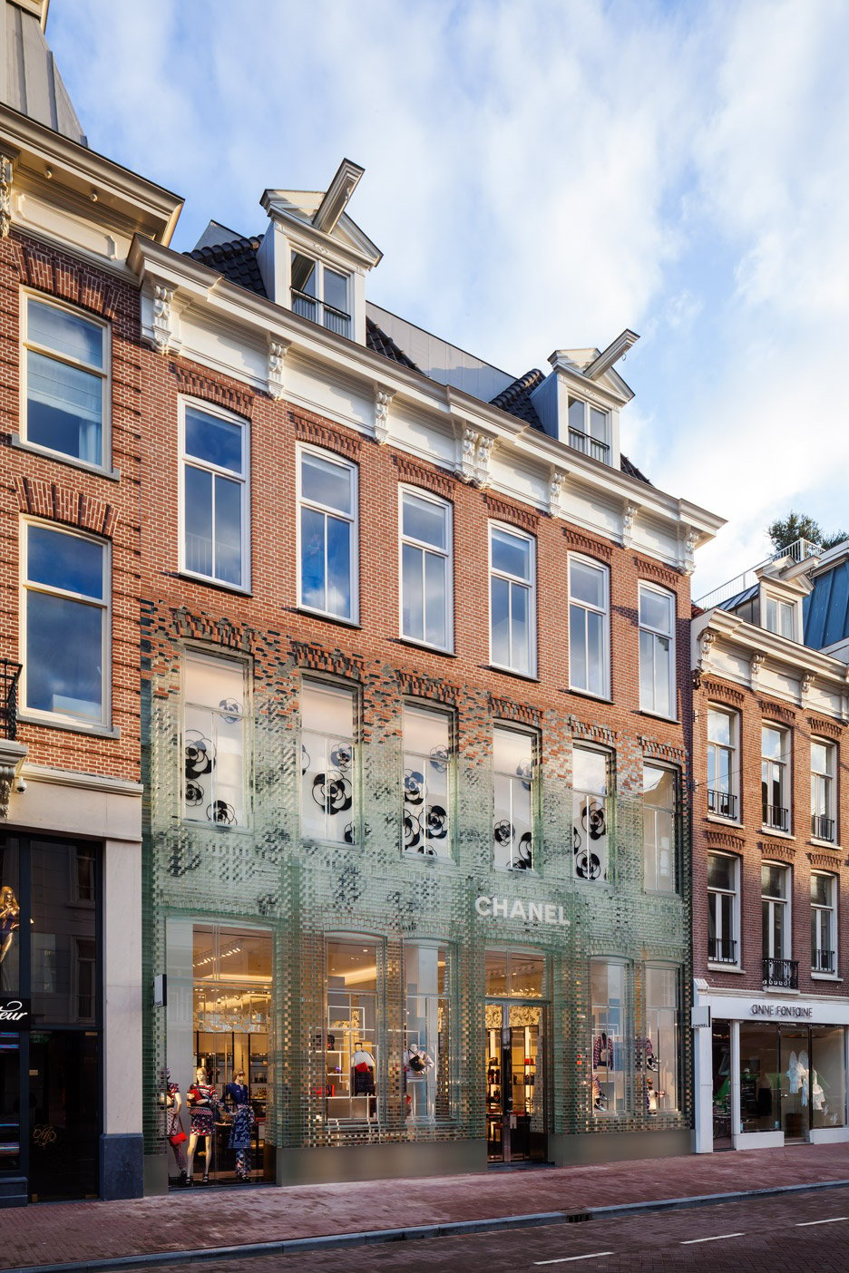MVRDV replaces traditional facade with glass bricks that are stronger than  concrete