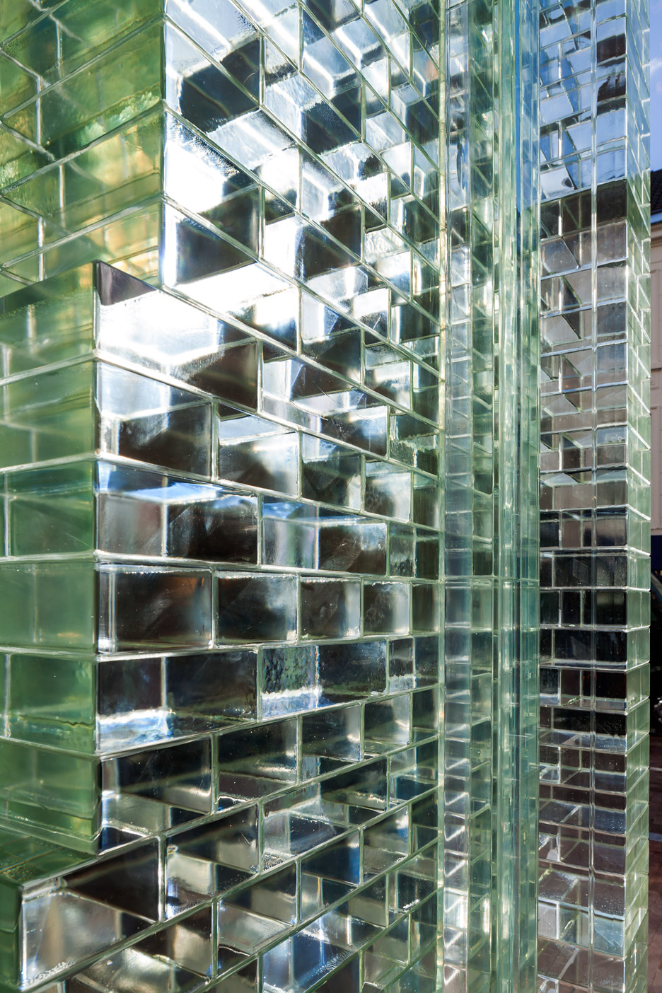 MVRDV replaces traditional facade with glass bricks that are stronger than  concrete