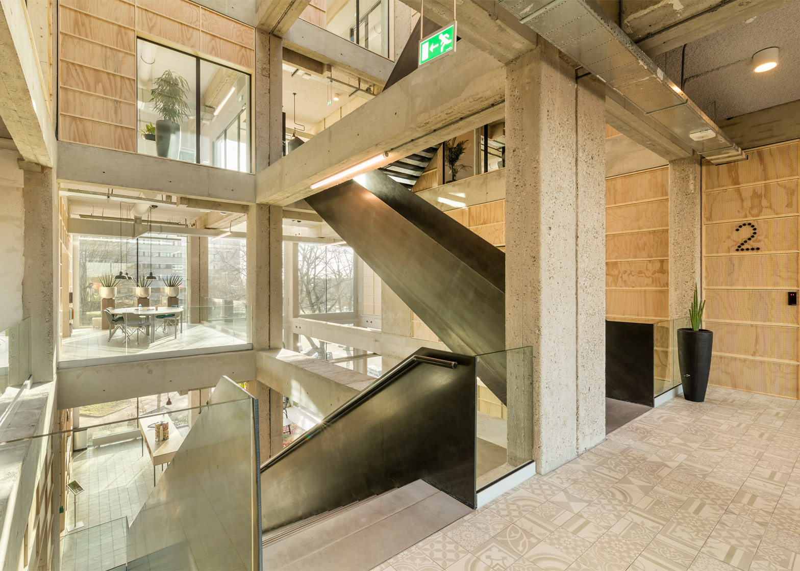 Studioninedots Carves Out An Atrium Inside Overhauled Office