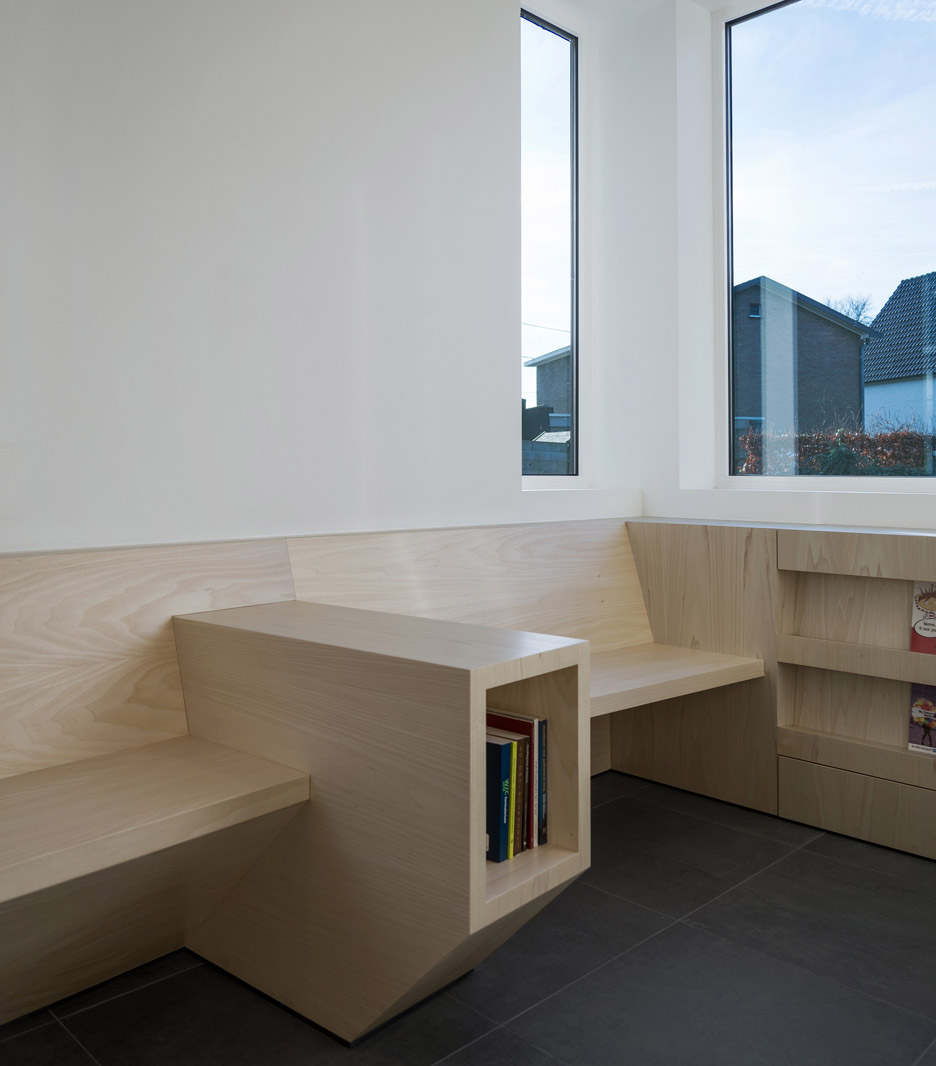 Joshua Florquin uses angular joinery to create bespoke furnishings for doctor's surgery in Maldegem, Belgium
