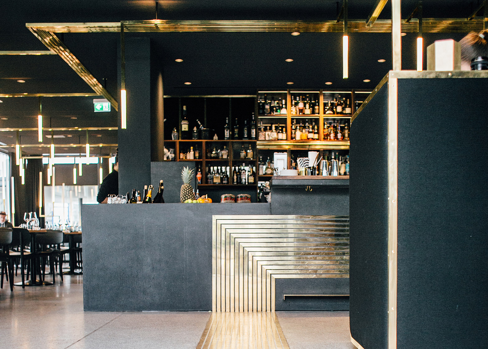 Build Architects adds brass "veins" bar interior