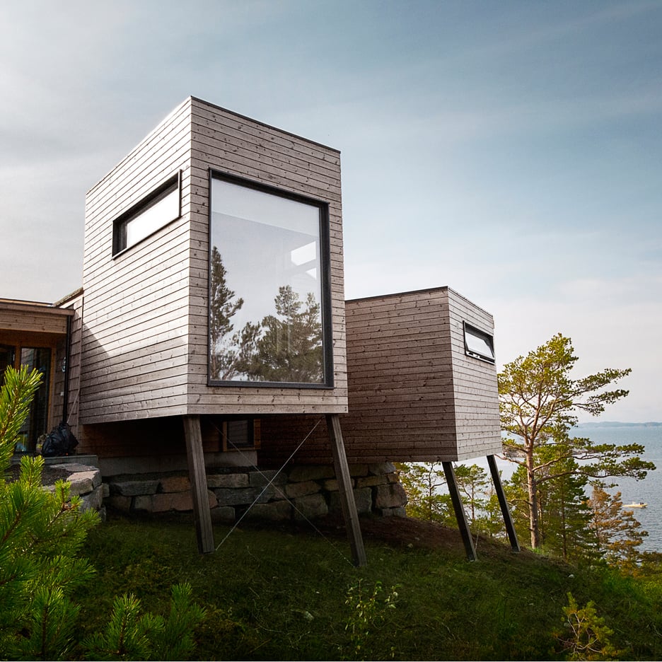 Rever & Drage's holiday cabin features wooden pods that frame views of a Norwegian fjord