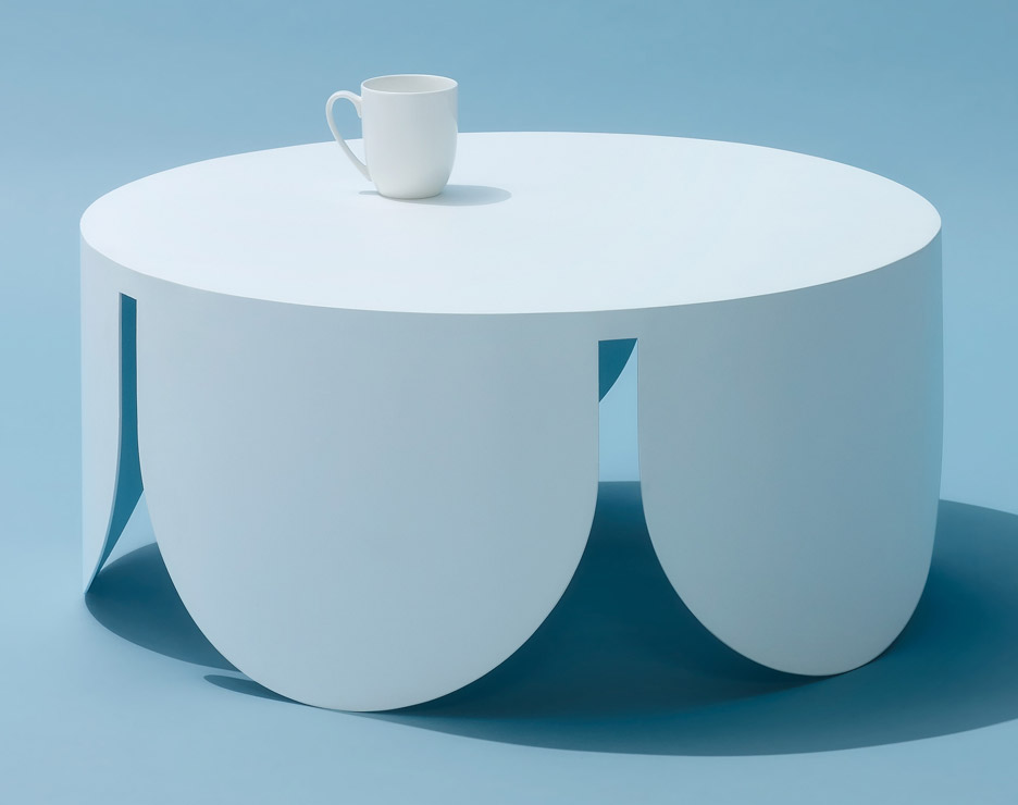 White coated steel coffee tables designed by Boardgrove Architects