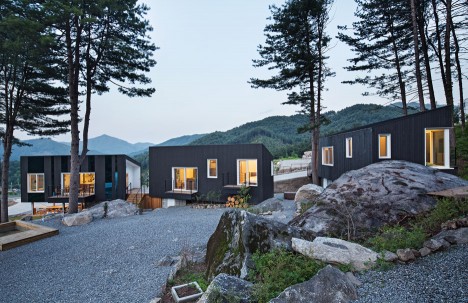 Wooden cabins and tents on stilts provide accommodation at South Korean glamping site