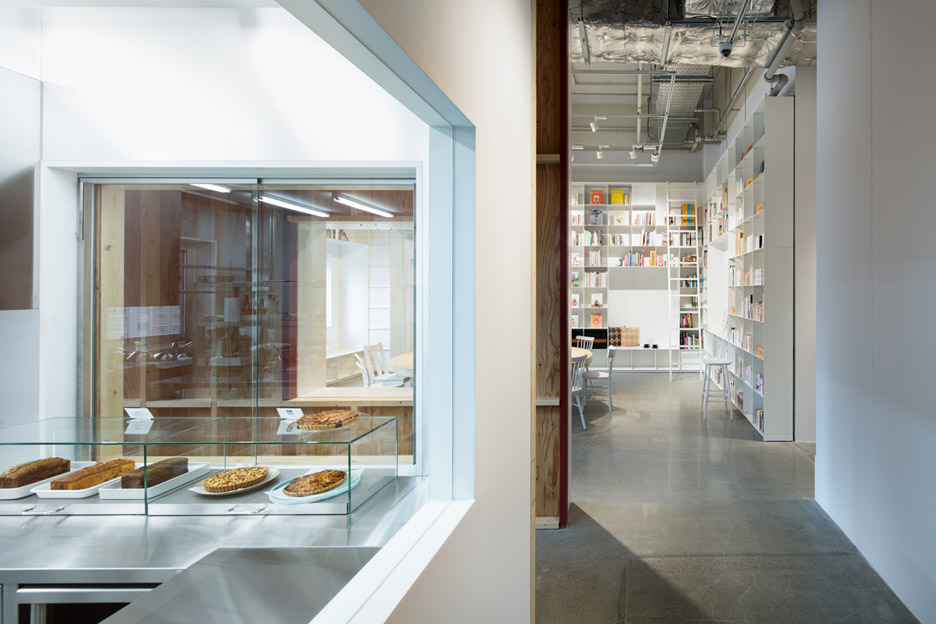 Hue Plus kitchen studio and library housed in a renovated warehouse building in Tokyo, Japan by Schemata Architects