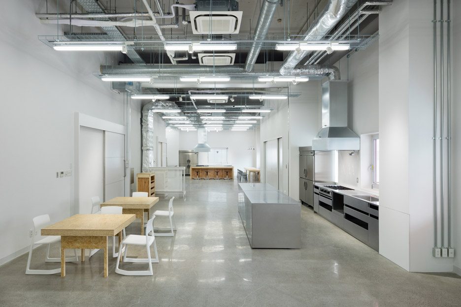 Hue Plus kitchen studio and library housed in a renovated warehouse building in Tokyo, Japan by Schemata Architects