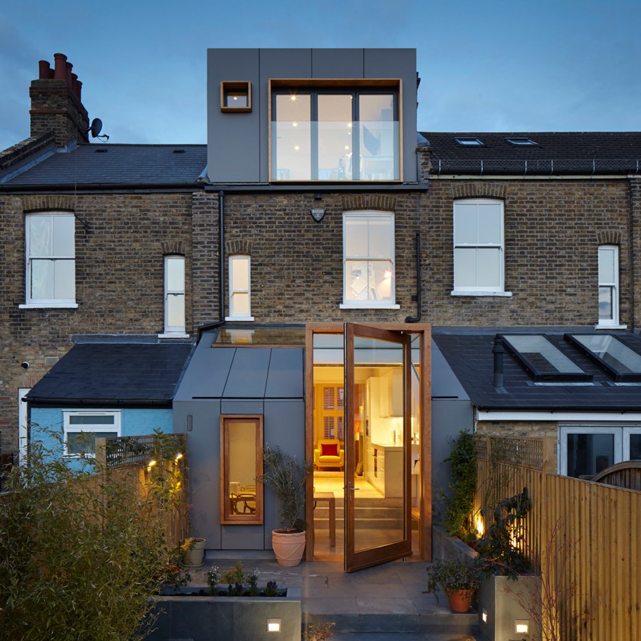 Alma-nac creates huge pivoting door for London house extension